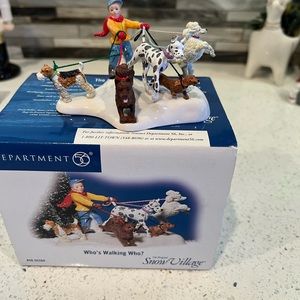 Dept 56 snow village Who’s walking Who?